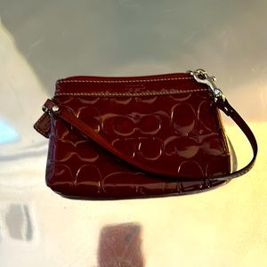 Coach small wristlet in wine patent leather